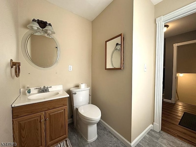 913 Renate Dr Unit 2, Hillsborough Twp, NJ 08844 - bathroom featuring vanity, toilet, wood finished floors, and baseboards