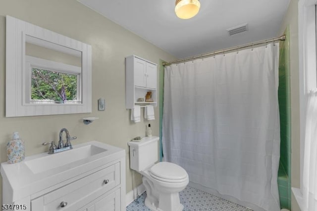 28 Academy St, Califon Boro, NJ 07830 - full bathroom with toilet, vanity, tile patterned floors, baseboards, and shower / bath combo with shower curtain