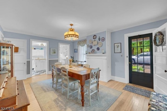 28 Academy St, Califon Boro, NJ 07830 - dining room featuring light wood-type flooring, baseboards, and ornamental molding