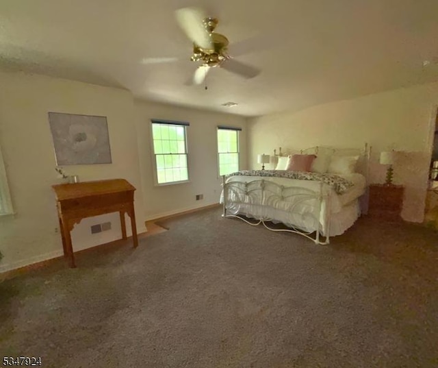 bedroom featuring visible vents, baseboards, ceiling fan, and carpet floors