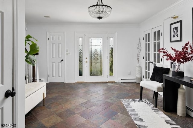 16 James Rd, Randolph Twp, NJ 07869 - foyer entrance featuring a baseboard heating unit, stone tile floors, crown molding, and a chandelier