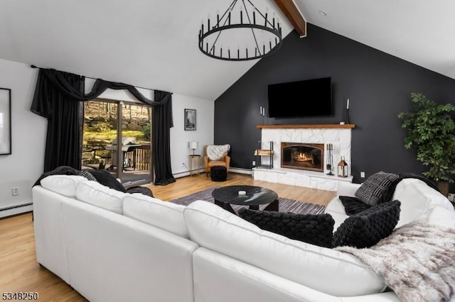 16 James Rd, Randolph Twp, NJ 07869 - living room with wood finished floors, baseboard heating, and a fireplace