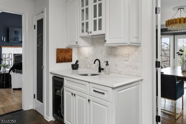 16 James Rd, Randolph Twp, NJ 07869 - bar area featuring wine cooler and decorative backsplash