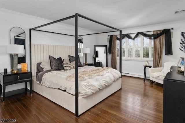 16 James Rd, Randolph Twp, NJ 07869 - bedroom featuring baseboard heating, ornamental molding, and wood finished floors
