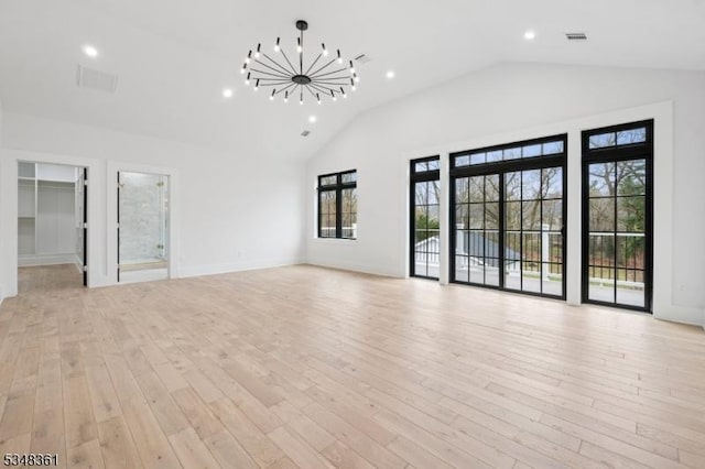 unfurnished living room featuring recessed lighting, baseboards, a chandelier, light wood finished floors, and visible vents
