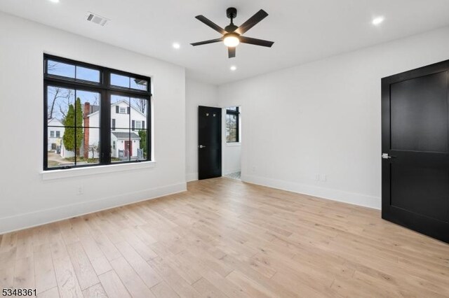 unfurnished room featuring visible vents, baseboards, ceiling fan, recessed lighting, and light wood-style floors