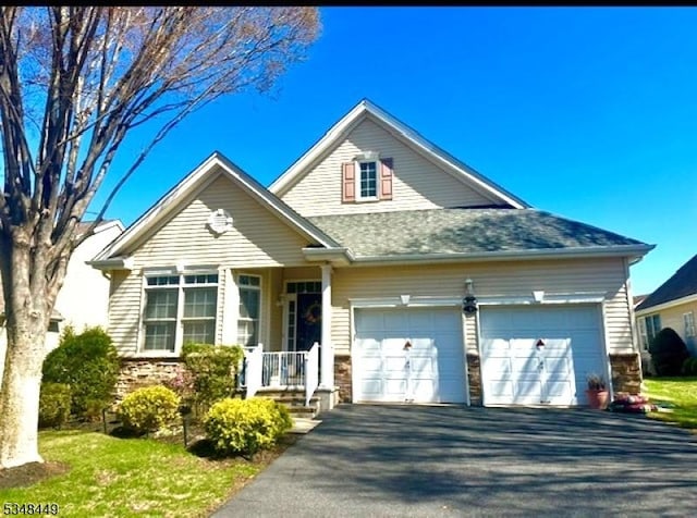 4 Hardenbergh St, Franklin Twp, NJ 08873 - view of front of home with a garage and aphalt driveway