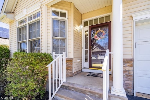 4 Hardenbergh St, Franklin Twp, NJ 08873 - property entrance featuring stone siding and a garage
