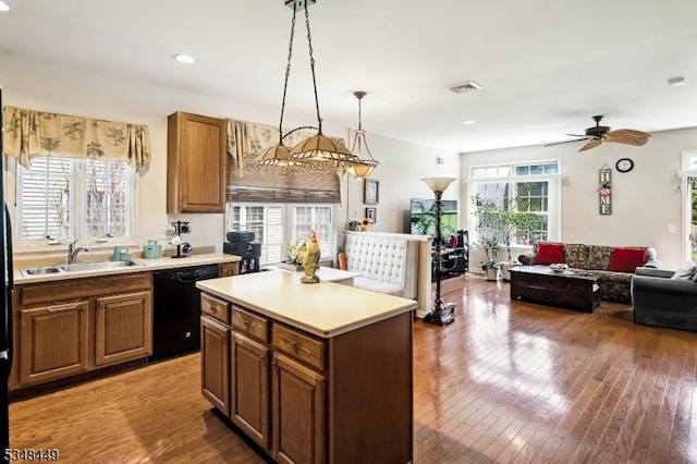 4 Hardenbergh St, Franklin Twp, NJ 08873 - kitchen with visible vents, dishwasher, a sink, light countertops, and open floor plan