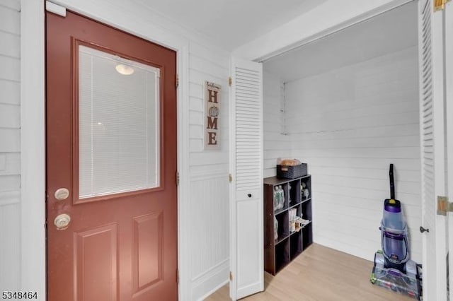 foyer with light wood-style floors