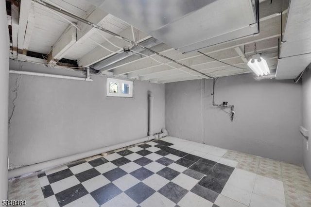 below grade area featuring tile patterned floors