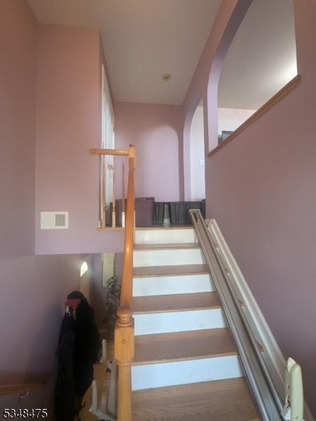 stairs with arched walkways