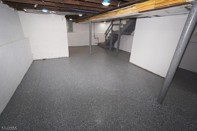 finished basement featuring stairway