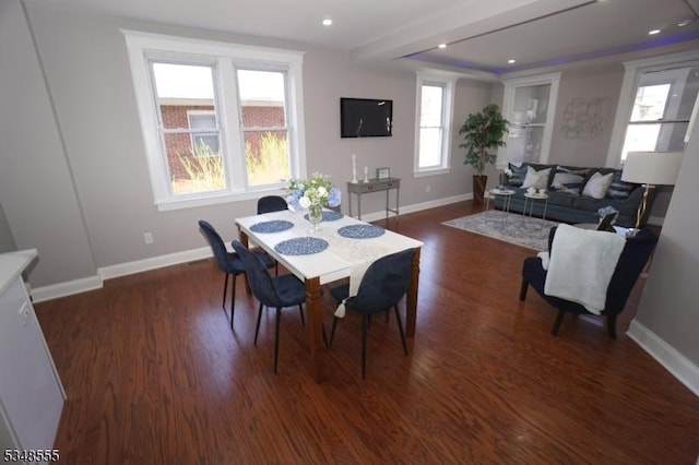 dining room featuring baseboards, dark wood finished floors, and recessed lighting