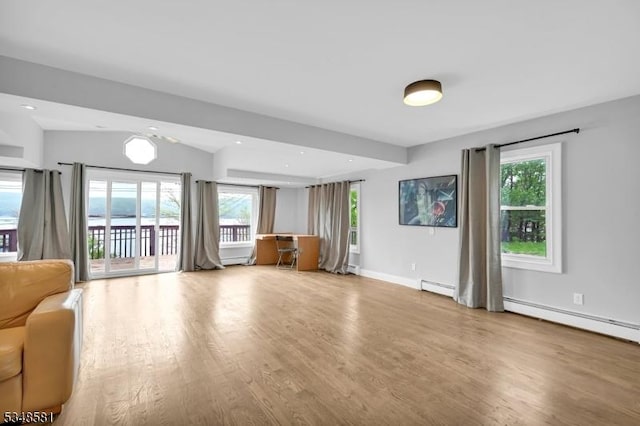 677 Warwick Tpke, West Milford Twp, NJ 07421 - unfurnished living room featuring wood finished floors, baseboards, recessed lighting, and a baseboard heating unit