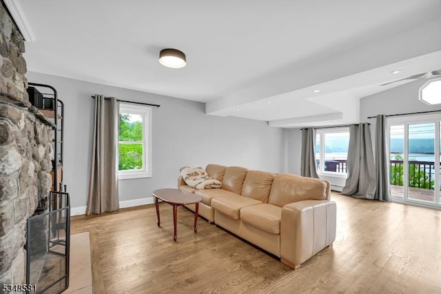 677 Warwick Tpke, West Milford Twp, NJ 07421 - living room featuring light wood-style floors, healthy amount of natural light, and baseboards
