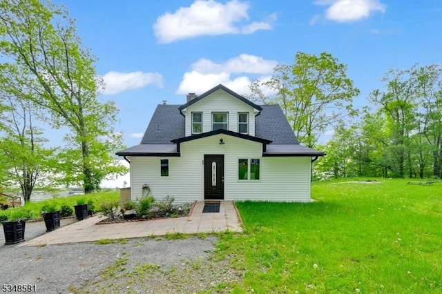 677 Warwick Tpke, West Milford Twp, NJ 07421 - back of house featuring a yard, a chimney, and roof with shingles