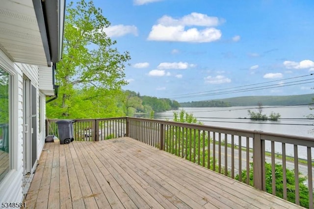 677 Warwick Tpke, West Milford Twp, NJ 07421 - wooden terrace with a water view