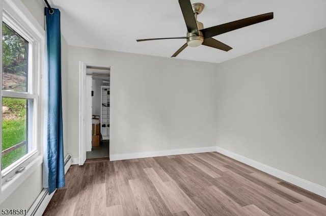 677 Warwick Tpke, West Milford Twp, NJ 07421 - empty room featuring a ceiling fan, wood finished floors, healthy amount of natural light, and baseboards