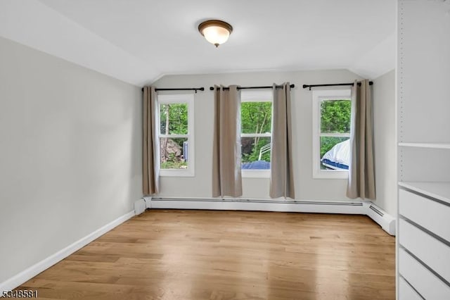 677 Warwick Tpke, West Milford Twp, NJ 07421 - unfurnished room featuring vaulted ceiling, light wood-type flooring, and baseboards
