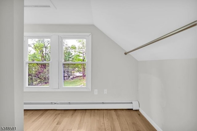 677 Warwick Tpke, West Milford Twp, NJ 07421 - bonus room with a baseboard radiator, vaulted ceiling, wood finished floors, and baseboards