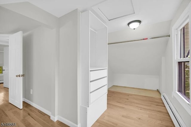 677 Warwick Tpke, West Milford Twp, NJ 07421 - spacious closet featuring a baseboard heating unit, light wood-style floors, and attic access