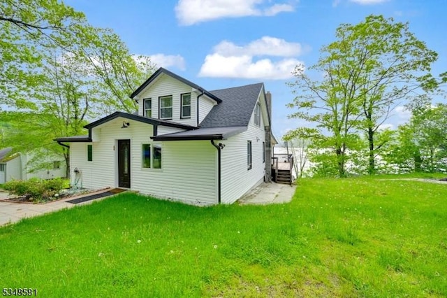 677 Warwick Tpke, West Milford Twp, NJ 07421 - rear view of house with a lawn