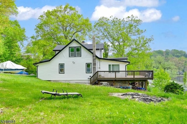 677 Warwick Tpke, West Milford Twp, NJ 07421 - rear view of property featuring a wooden deck and a yard