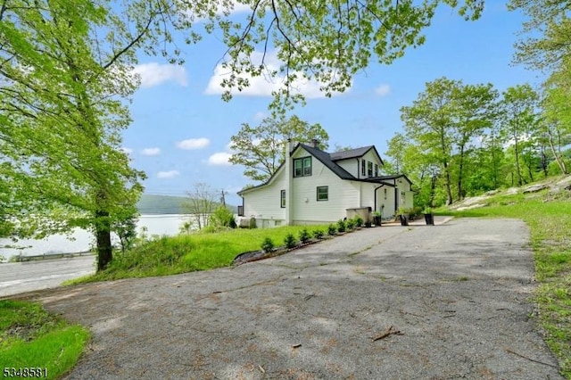 677 Warwick Tpke, West Milford Twp, NJ 07421 - view of property exterior featuring driveway
