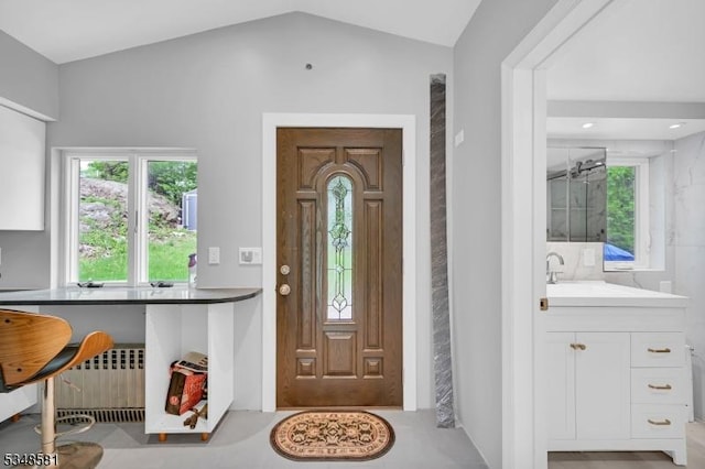 677 Warwick Tpke, West Milford Twp, NJ 07421 - entryway with radiator and vaulted ceiling