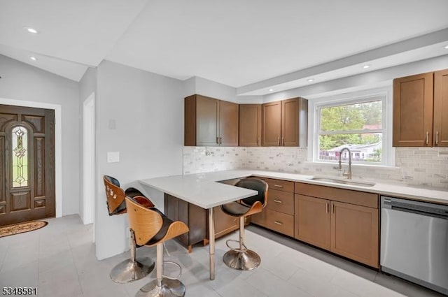 677 Warwick Tpke, West Milford Twp, NJ 07421 - kitchen featuring stainless steel dishwasher, a sink, decorative backsplash, light countertops, and recessed lighting