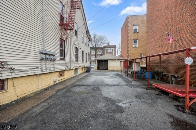 view of road with aphalt driveway
