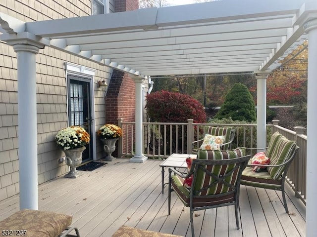 wooden terrace with a pergola