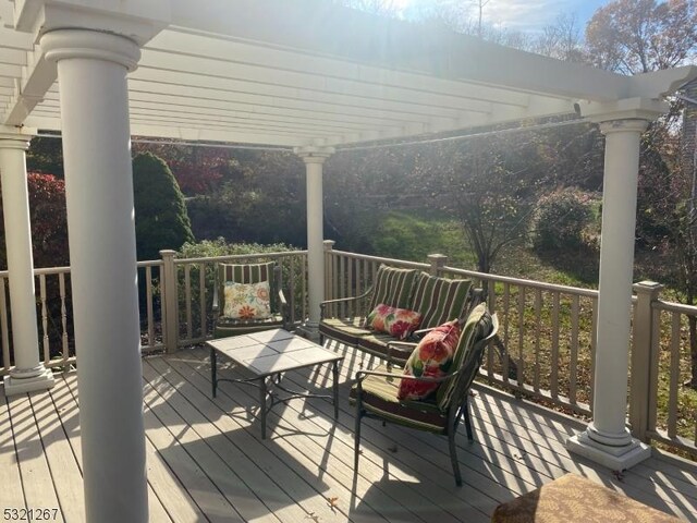 deck featuring a pergola