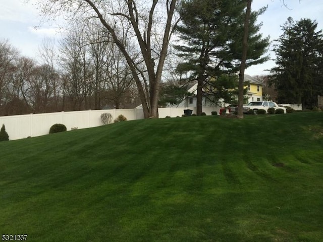 view of yard with fence