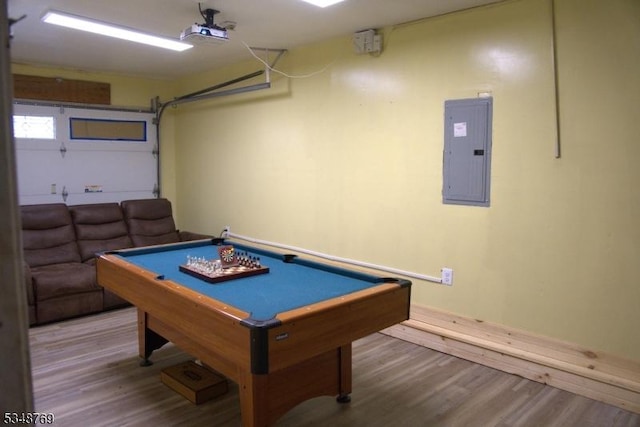 recreation room with electric panel, baseboards, billiards, and wood finished floors