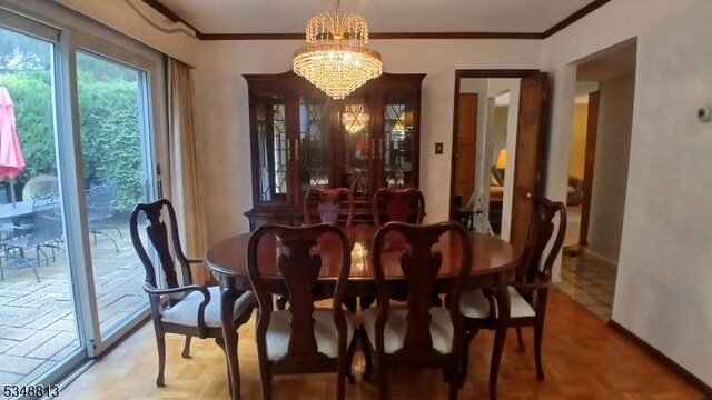29 King Rd, Franklin Twp, NJ 08873 - dining room featuring baseboards, a notable chandelier, and ornamental molding
