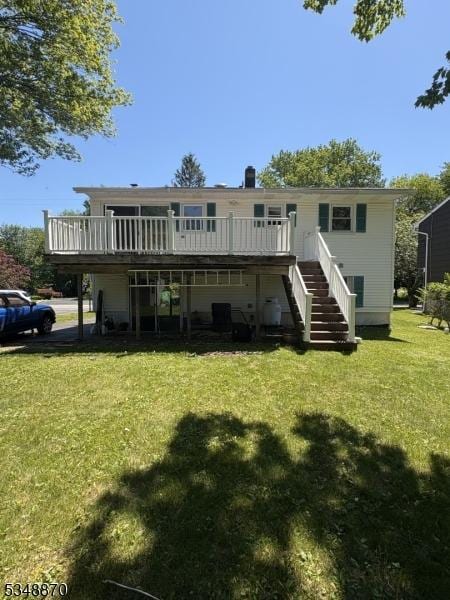 108 Santa Clara Trl, Hopatcong Boro, NJ 07843 - back of house with stairway, a wooden deck, and a yard