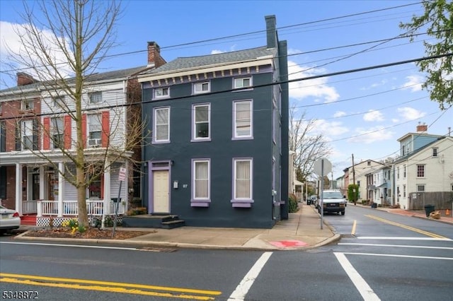 97 N Main St, Lambertville City, NJ 08530 - townhome / multi-family property featuring a chimney and a residential view