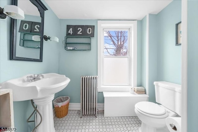 97 N Main St, Lambertville City, NJ 08530 - bathroom featuring a sink, toilet, radiator, and baseboards
