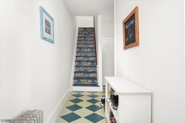 97 N Main St, Lambertville City, NJ 08530 - hallway featuring baseboards, stairway, and light floors