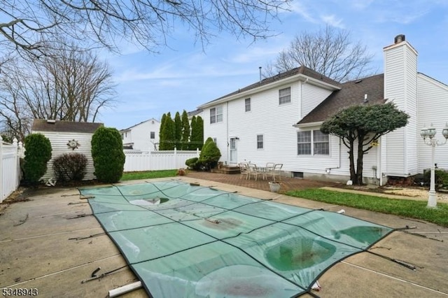 view of pool featuring fence, a patio area, and a fenced in pool