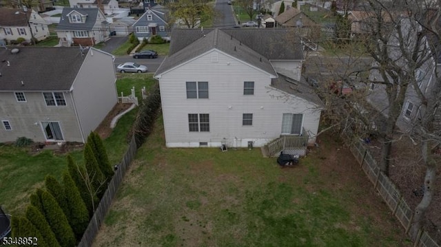 birds eye view of property with a residential view