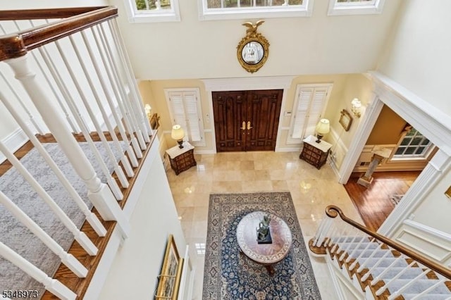 2 Queens Ct, Mendham Twp, NJ 07960 - tiled entryway featuring stairs and a high ceiling