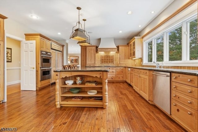 2 Queens Ct, Mendham Twp, NJ 07960 - kitchen with appliances with stainless steel finishes, open shelves, custom range hood, wood finished floors, and tasteful backsplash
