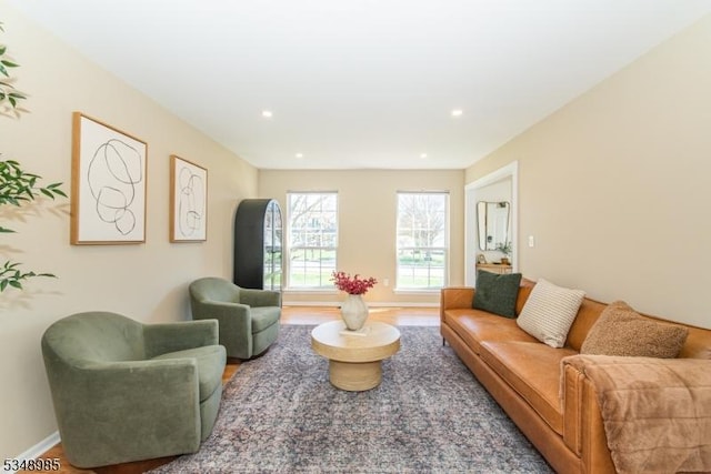living area featuring recessed lighting and wood finished floors