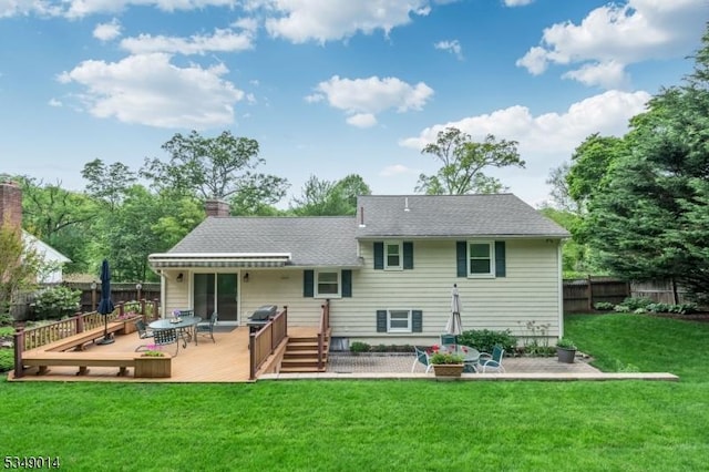 84 Burnham Pkwy, Morris Twp, NJ 07960 - rear view of property featuring a wooden deck, a chimney, and a shingled roof