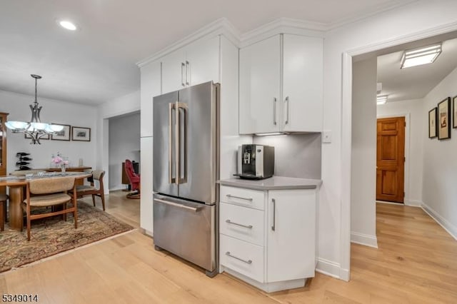 84 Burnham Pkwy, Morris Twp, NJ 07960 - kitchen featuring high end refrigerator, light wood-type flooring, white cabinetry, a chandelier, and recessed lighting