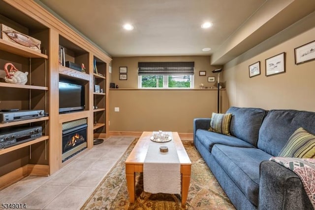 84 Burnham Pkwy, Morris Twp, NJ 07960 - living area with recessed lighting, a glass covered fireplace, and light tile patterned flooring