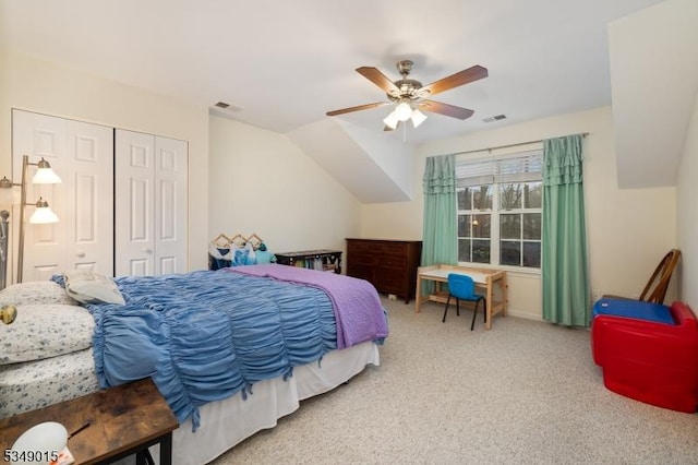 carpeted bedroom with visible vents, ceiling fan, and a closet
